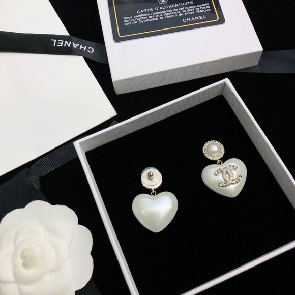 "Regal Rosettes: Rose Gold Statement Earrings by CHANEL" - Picture 7 of 8